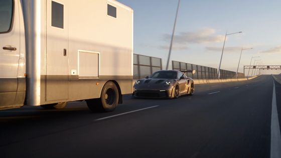 The Porsche Behind
